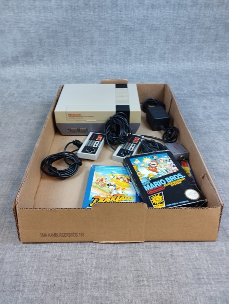 Nintendo spelkonsol med tillbehör & 3 spel.