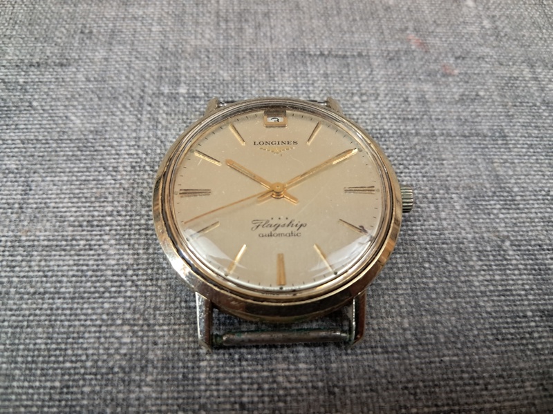 Herrur. Longines. Flagship, Guld på stål, Datumangivelse.