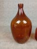 2 Flaskor, brunt glas.