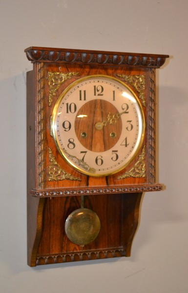 Väggur. En Genfa modell från Carl Westh.