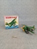 Flygplan. "Curtiss", Plåt, Kina, Samtida. Original låda.