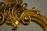 Spegel. Förgylld plast, 1900-talets senare del.