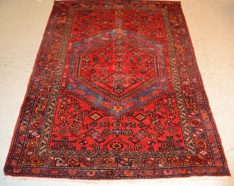 Handknuten persisk matta.