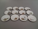 12 Handmålade tallrikar, signerad J.Brødbøk.
