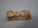 Dolce & Gabbana, Damur, förgyllt stål med fasettslipat glas.