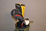 Golfbag med klubbor m.m.