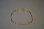 Armband. 18K guld, 1,79 gram, syratestat.