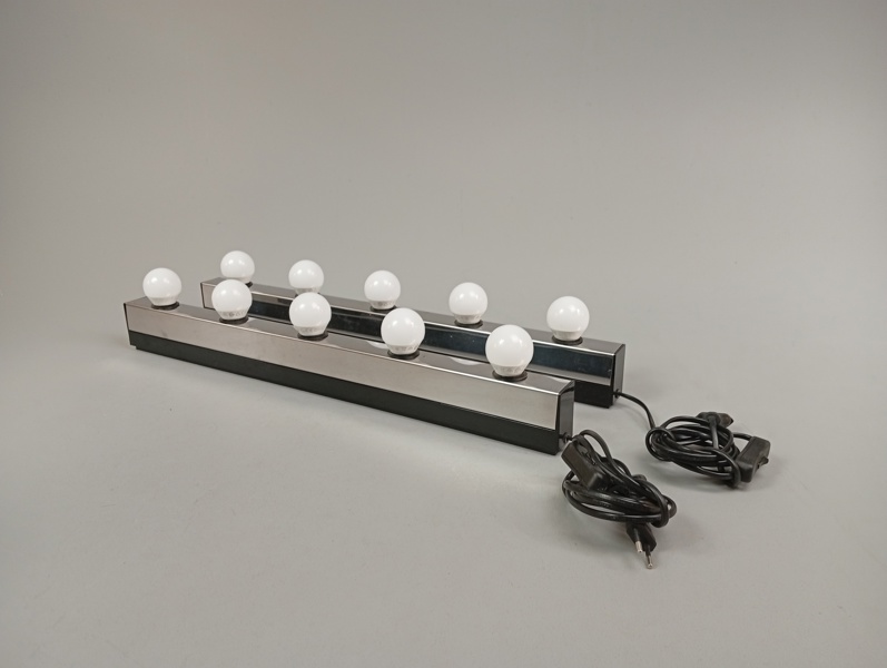 Sminkbelysning till vägg.