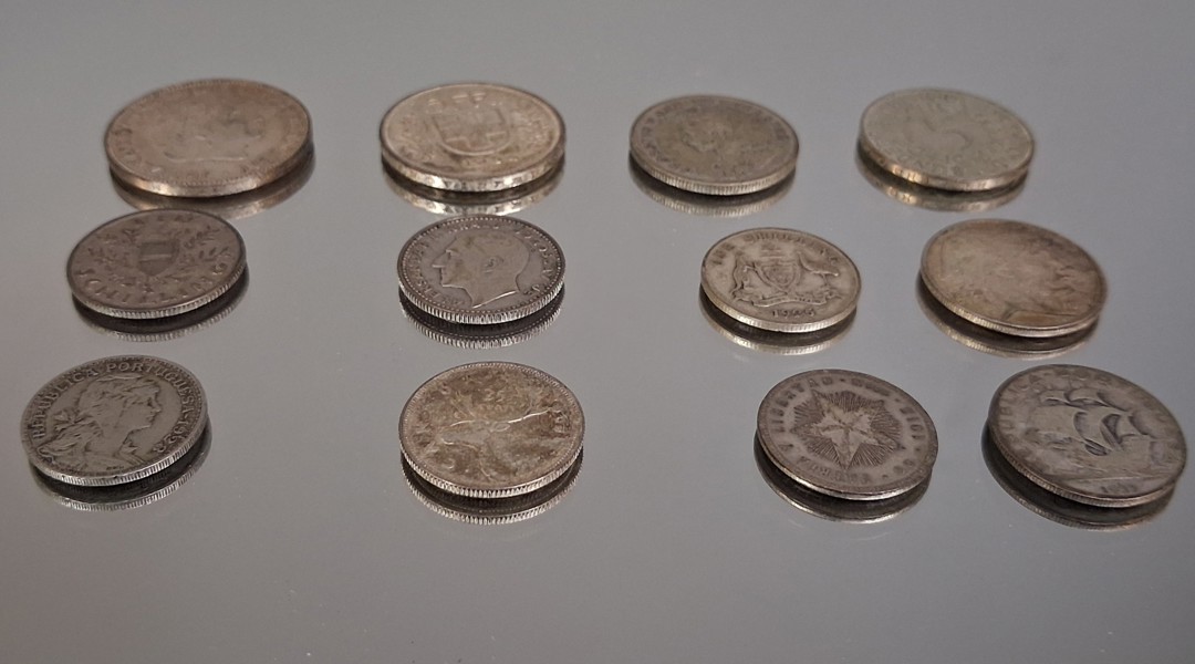 Utländska silvermynt, 100gram, olika länder.