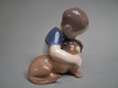 FIGURIN. "Pojke med hund", Bing & Gröndal.
