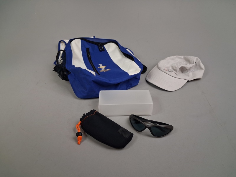 Volvo Ocean Race, Keps 2005-2006, Solglasögon Polarid, samt ryggsäck Solheim cup 2007.