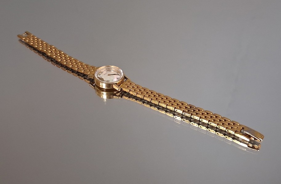 Damur. Facit, Uret i 18K Guld & guldförgylld rostfri länk.