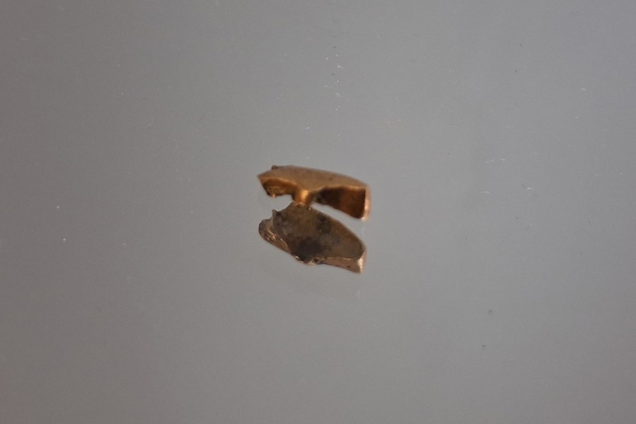 Skrotguld. 18K Guld, 0,39 gram, syratestat.