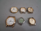 Diverse klockor & några mynt.