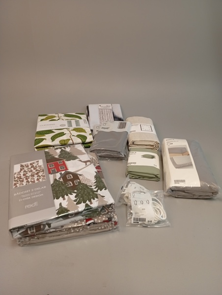 Diverse textil. Oanvänt.