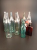 Diverse glasflaskor. Bl.a Kinnekulle, Coca Cola.