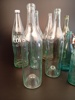 Diverse glasflaskor. Bl.a Kinnekulle, Coca Cola.