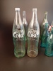Diverse glasflaskor. Bl.a Kinnekulle, Coca Cola.