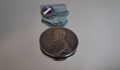 Medalj & klubbmärke, silver, 34gram.