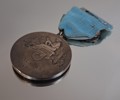 Medalj & klubbmärke, silver, 34gram.