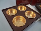 8 Underlägg/coasters, Scandia guld & 4 punchbägare, Scandia silver.