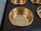 8 Underlägg/coasters, Scandia guld & 4 punchbägare, Scandia silver.