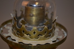Bordsfotogenlampa. 1900-Talets första hälft, mässing & glas.