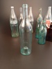 Diverse glasflaskor. Bl.a Kinnekulle, Coca Cola.