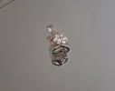Halsbands hänge, 18K vitguld med smaragder, 1,79gram samt halskedja, silver, 1,72gram.