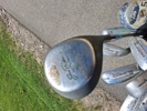 Golfbag med klubbor.