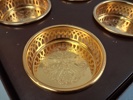 8 Underlägg/coasters, Scandia guld & 4 punchbägare, Scandia silver.