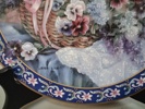 LENE LIU. 9 Samlartallrikar, Porslin. Blomstermotiv.