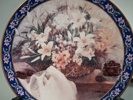 LENE LIU. 9 Samlartallrikar, Porslin. Blomstermotiv.