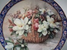 LENE LIU. 9 Samlartallrikar, Porslin. Blomstermotiv.