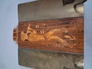 Vägglampett. Mjölby Intarsia 1940-tal.