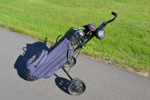 Golfbag med klubbor.