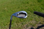 Golfbag med klubbor.