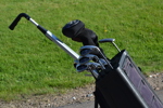 Golfbag med klubbor.