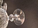 VICKE LINDSTRAND. 12 Vinglas & 11 Selterglas, "Diamant", Kosta.