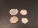 Utländska silvermynt. 1 Markka 1964, 6 Pence 1928, 1 Gulden 1958 & 5 Franc 1968.