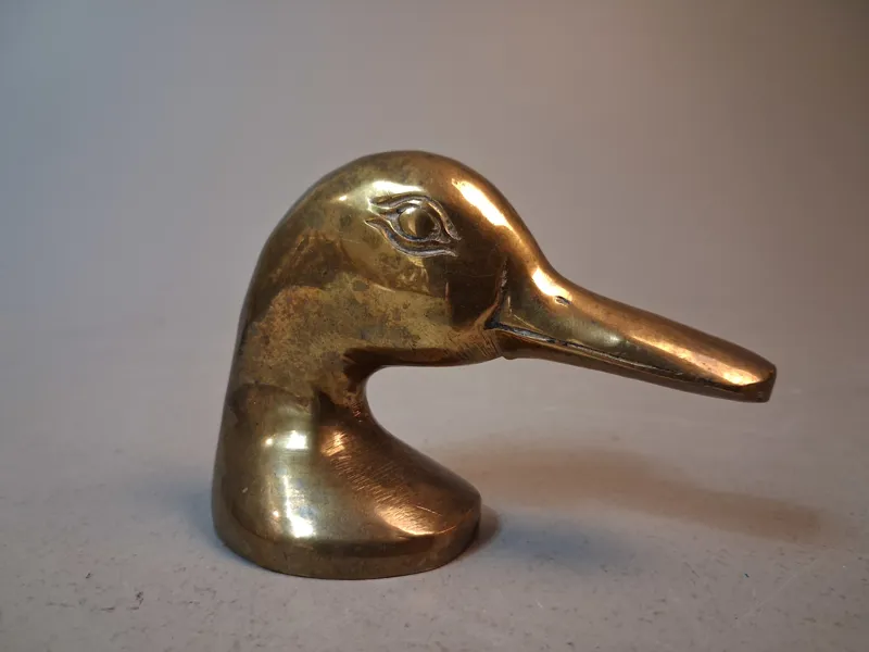 Kapsylöppnare. "Ducky", Mässing, osignerad.