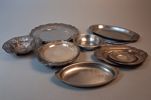 Diverse brickor, rostfria, nysilver.