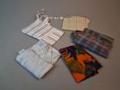 Diverse textil. Bl.a dukar, förkläde m.m.