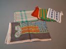 Diverse textil. Bl.a dukar, förkläde m.m.
