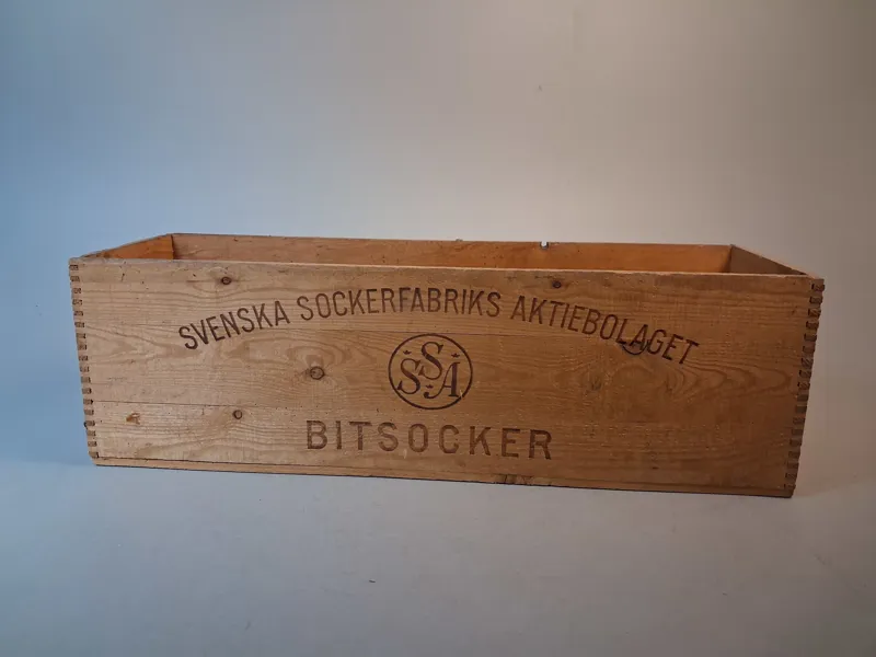 Trälåda. Svenska sockerfabrikens aktiebolaget SSA, 1900-talets första hälft.