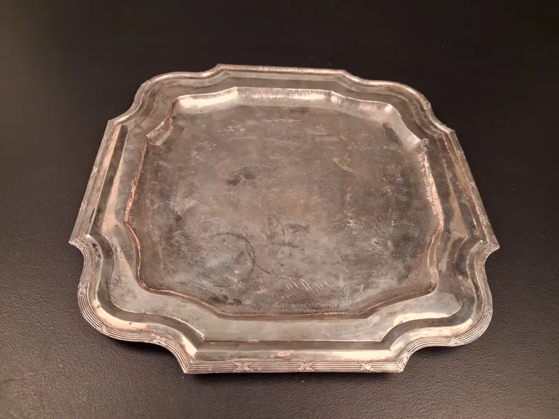 Silverbricka. TRP Bogota, År 1910, vikt: 650gram, syratestad.