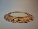 Spegel. Oval form. Samtida, Plast.