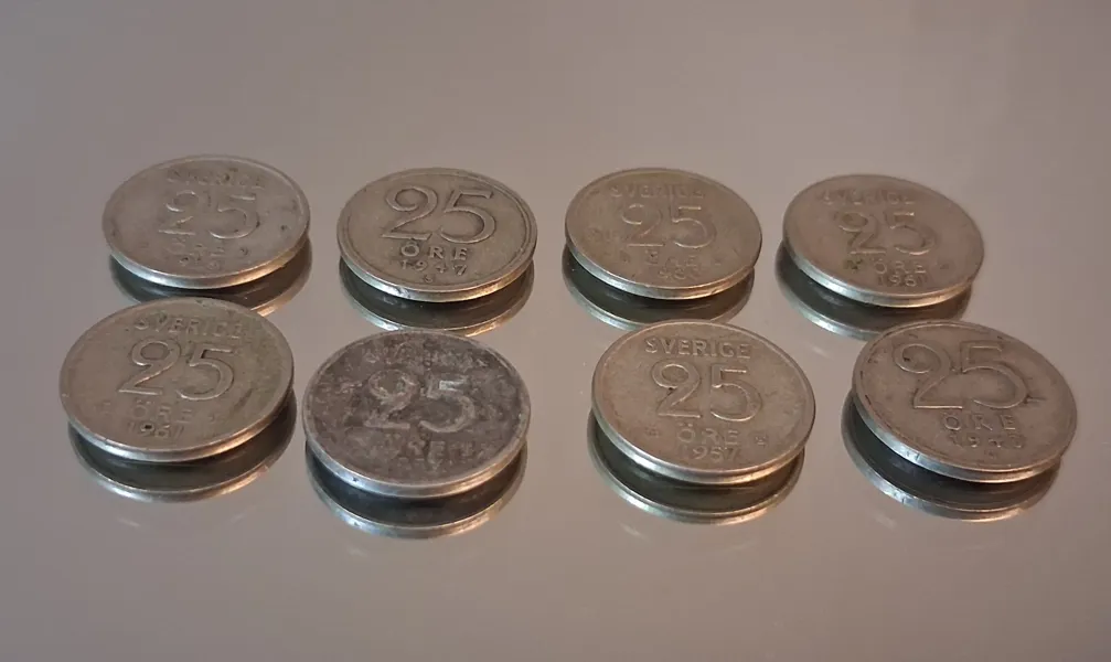 8 Stycken 25 öringar. silver, 1943,1947, 1956, 1957, 1960 & 1961.