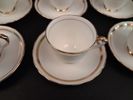 12 Moccakoppar med fat. New Chelsea Fine Bone China, made in England.