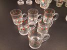 Diverse glas. Bl.a 2 snapsglas Rustika, Göran Wärff, 3 glöggmuggar tomte.